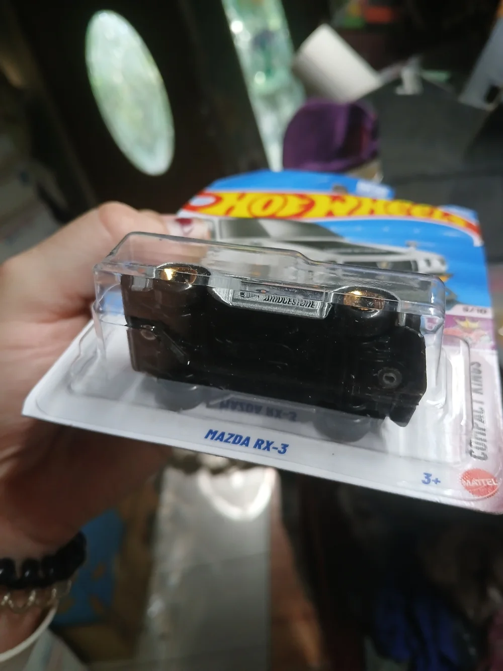 silver Hot Wheels Mazda RX-3 from the HW Compact Kings series